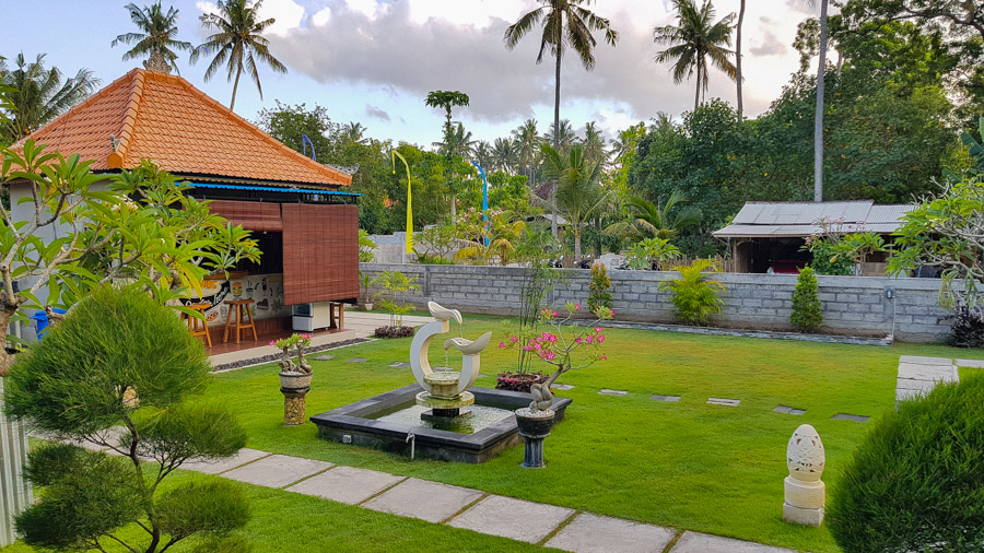A garden with water feature at Gus Mank Stay, Nusa Penida