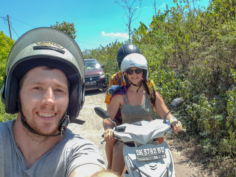 Bike riders in helmets on Nusa Penida