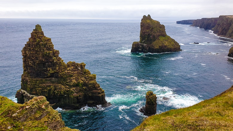 Twin sea stacks rising from the North Sea along the North Coast 500 route