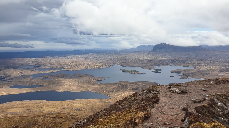A panoramic view of the landscape from the Stac Pollaidh summit